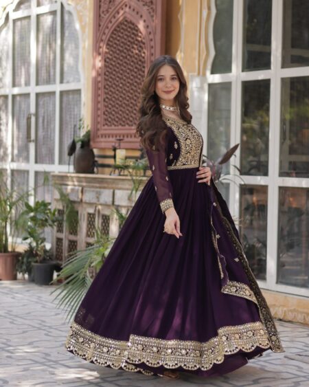 Women's Luxurious Plum Velvet Anarkali Gown with Heavy Gold Zari & Sequin Embroidery – Perfect for Weddings & Grand Festivities
